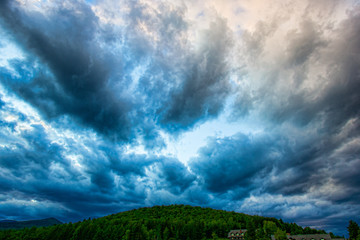 Obraz na płótnie Canvas Dramatic stormy billowing cloudy sky.