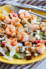 Fresh shrimps, eggs, croutons and vegetables salad