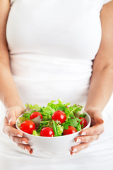 Young woman with salad