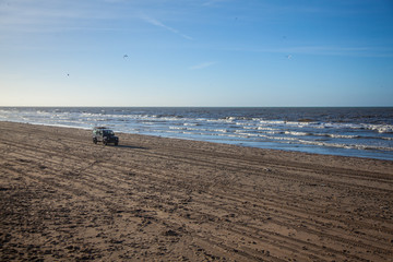 Offroad Car on a beach in the Netherlands