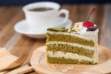green tea cake with a coffee cup