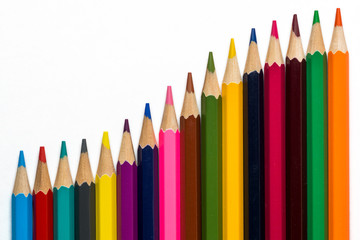 curved colorful pencils on white background 1
