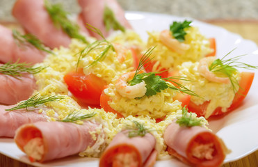 Shrimp salad, ham, tomatoes and eggs