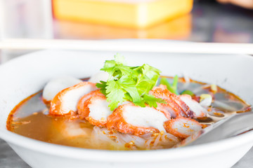 Asian style red pork noodles in soup