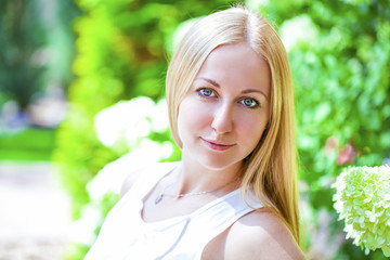 Portrait of young blonde woman