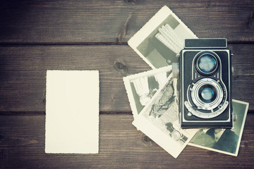 Vintage photo of old camera and old photos