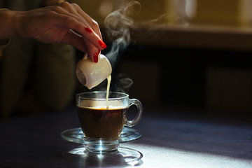 coffee with cream on table