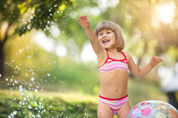 Cute little girl having fun outside © Halfpoint