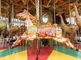 Horses on a traditional vintage carousel