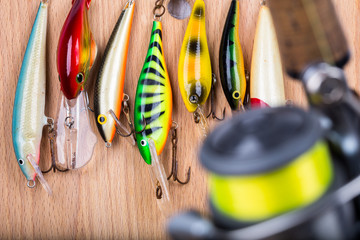 Obraz premium fishing bait wobbler and reel with line
