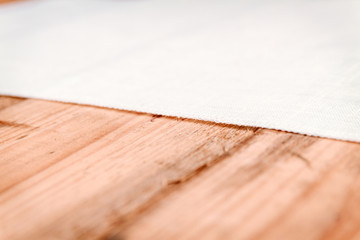 Linen cloth on an old wooden table.  concept
