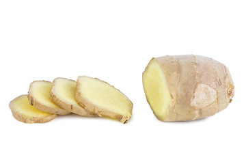 Close-up of piece and slices of fresh ginger root, isolated on white background.