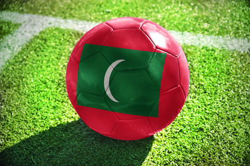 Fototapeta na wymiar football ball with the national flag of maldives