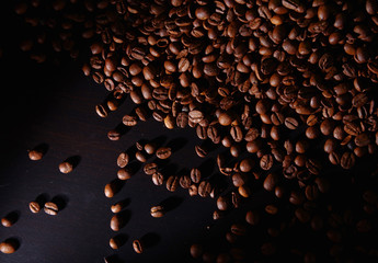 Close up of coffee beans on black table