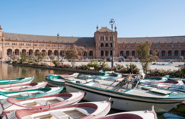 Naklejka premium Boats at the Plaza de Espana in Seville