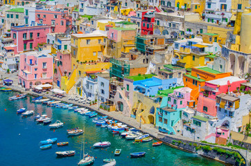 Fototapety  italian island procida is famous for its colorful marina, tiny narrow streets and many beaches which all together attract every year crowds of tourists coming from naples - napoli.