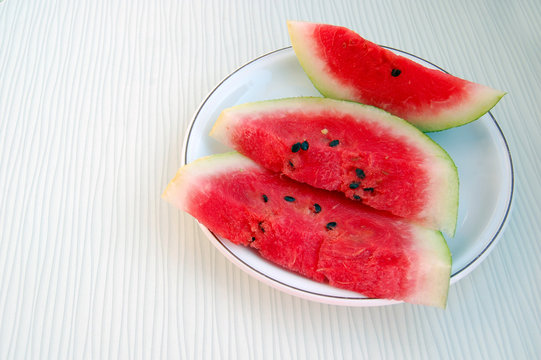fresh fruits background with watermelon on white table