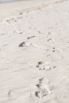 Footprints on sand with selective focus 