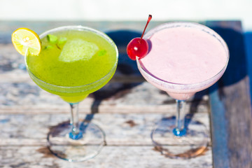 Two tasty cocktails on tropical white beach