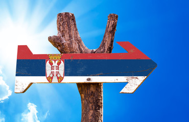 Serbia Flag wooden sign with sky background