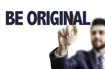 Business man pointing the text: Be Original