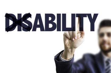 Business man pointing the text: Disability/Ability