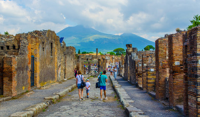 people are walking through ruins of the historical city of pompeii.