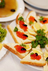 Sandwiches with red caviar