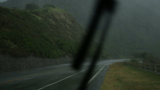 Heavy rain from inside car with windscreen wiper going