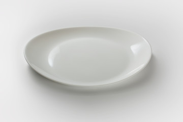 White dish plate, like a product, in studio with white background
