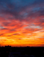 Naklejka premium Fiery orange sunset sky. Beautiful sky.