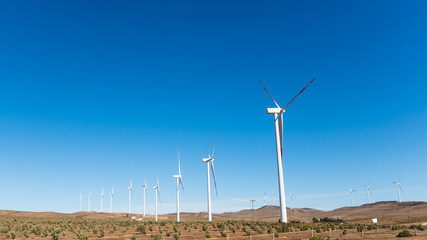 Beautiful and ecologic windmills in the north of Chile © progat