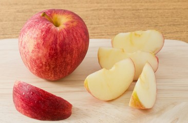 Ripe Red Apple on A Wooden Tray