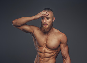 Fototapeta premium Shirtless muscular man with beard.