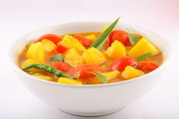 Tomato and potato curry