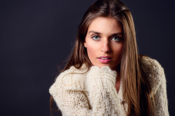 Portrait of a blonde blue eyed woman.