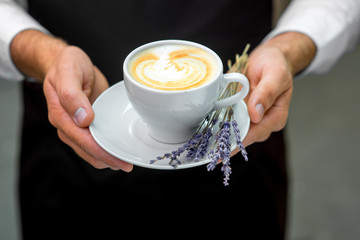 Holding lavander cappuccino
