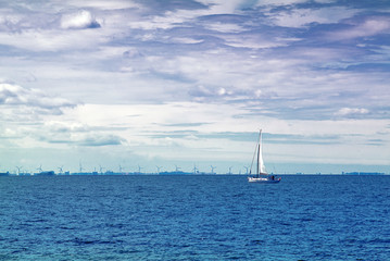 Sailing Boat on Open Blue Sea