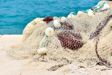 Obraz premium Stacked and piled fishing nets