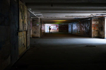 Street musician plays in the underpass