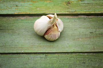 garlic on old wooden background