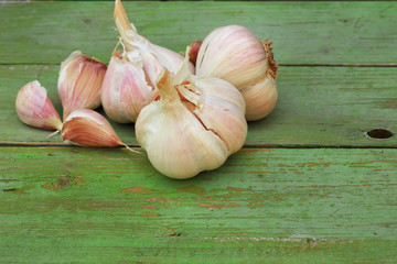 garlic on old wooden background