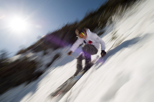 Motion blurred image of an expert skier.