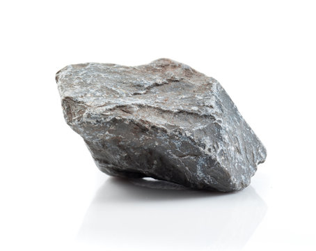 Fragment of granite on a white background.