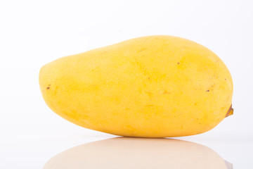 yellow mango fruit on a background