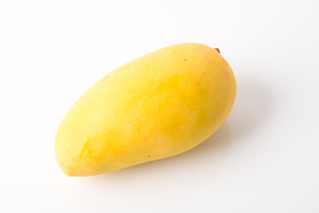 yellow mango fruit on a background