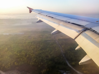 Fototapeta premium Sunset view from airplane