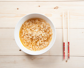 Instant noodles on wood baord