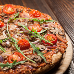 Pizza with bacon and mushrooms