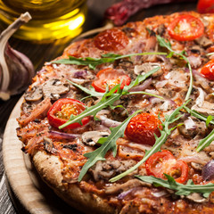 Pizza with bacon and mushrooms